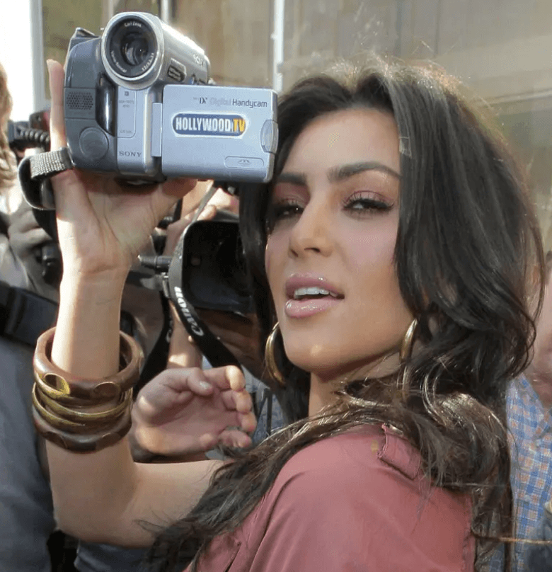 Kim Kardashian holding a Hollywood.TV camera